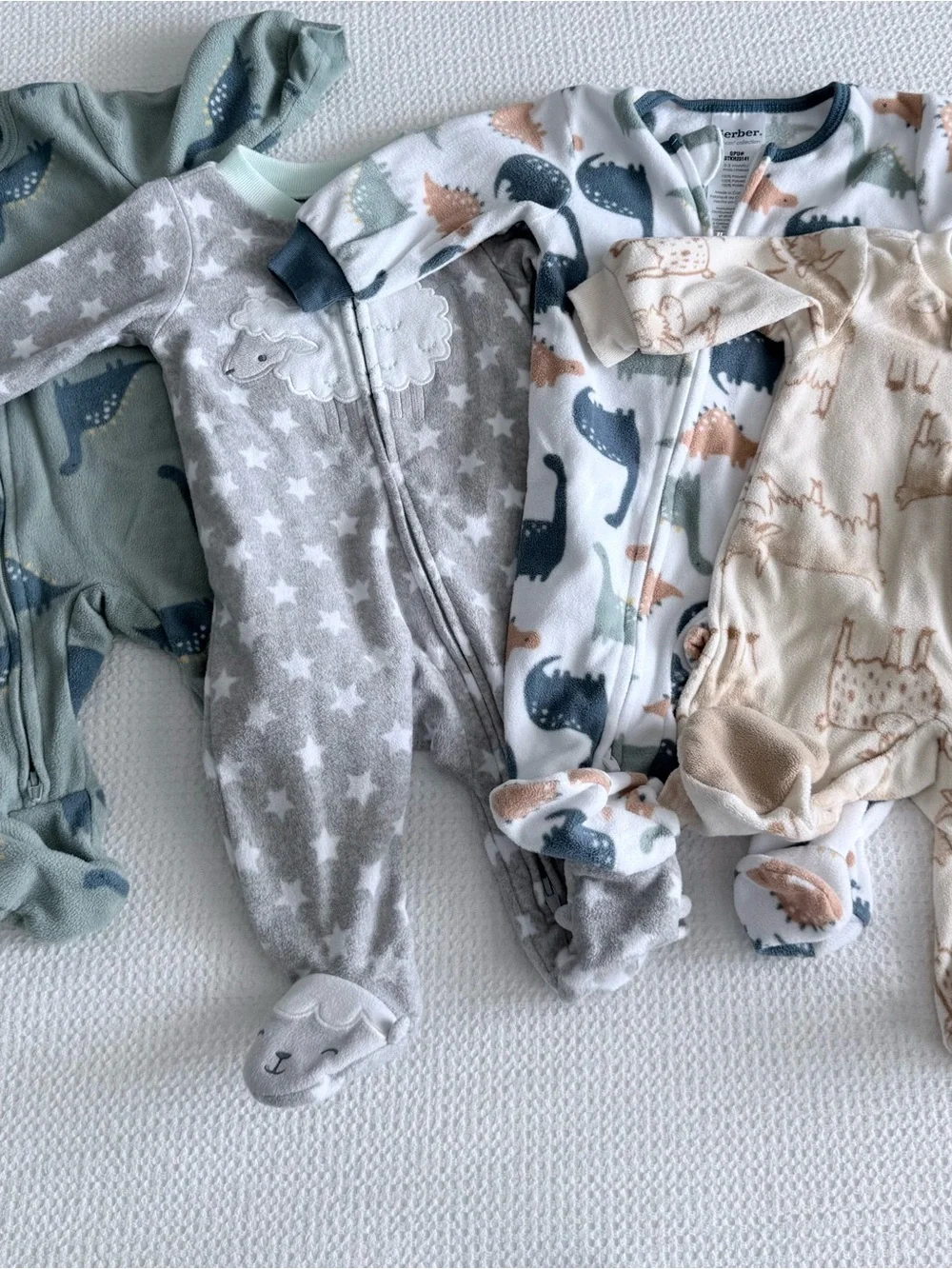 4-Pack Multi-Color Baby Fleece Footed Onesies- Dinosaur & Sheep Prints